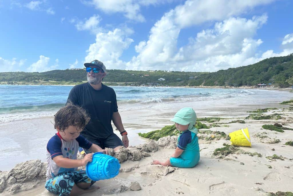 Family on beach at Half Moon Bay Antigua