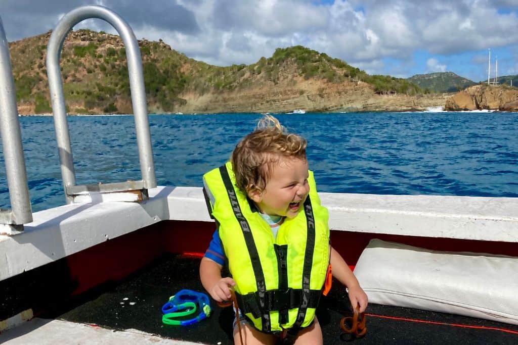 toddler on a boat tour in Antigua