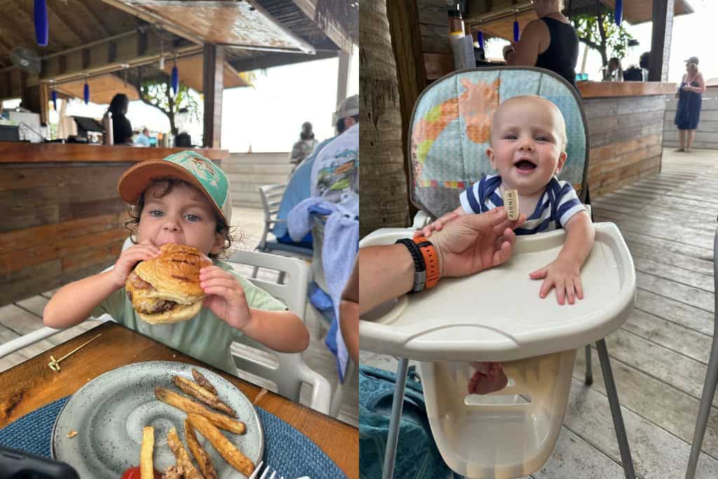 Baby and toddler eating in a restaurant in Antigua