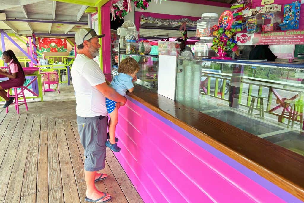 Boy and man buying ice cream at a cafe in Antigua