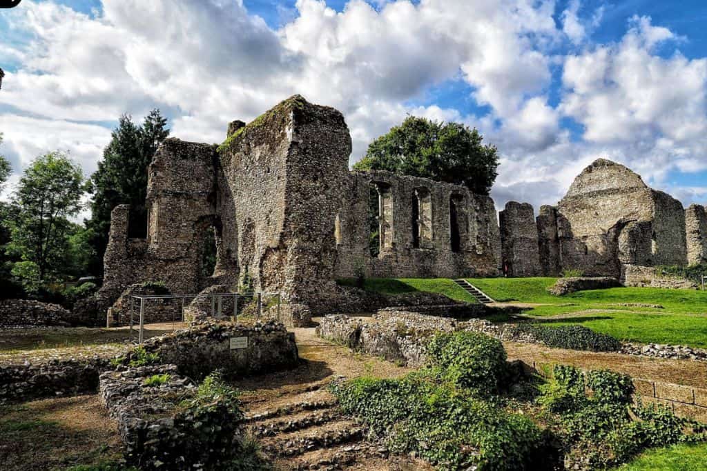 The outside and ruins of a castle. This is Bishop's Waltham Palace which is one of the best things to do in Hampshire.