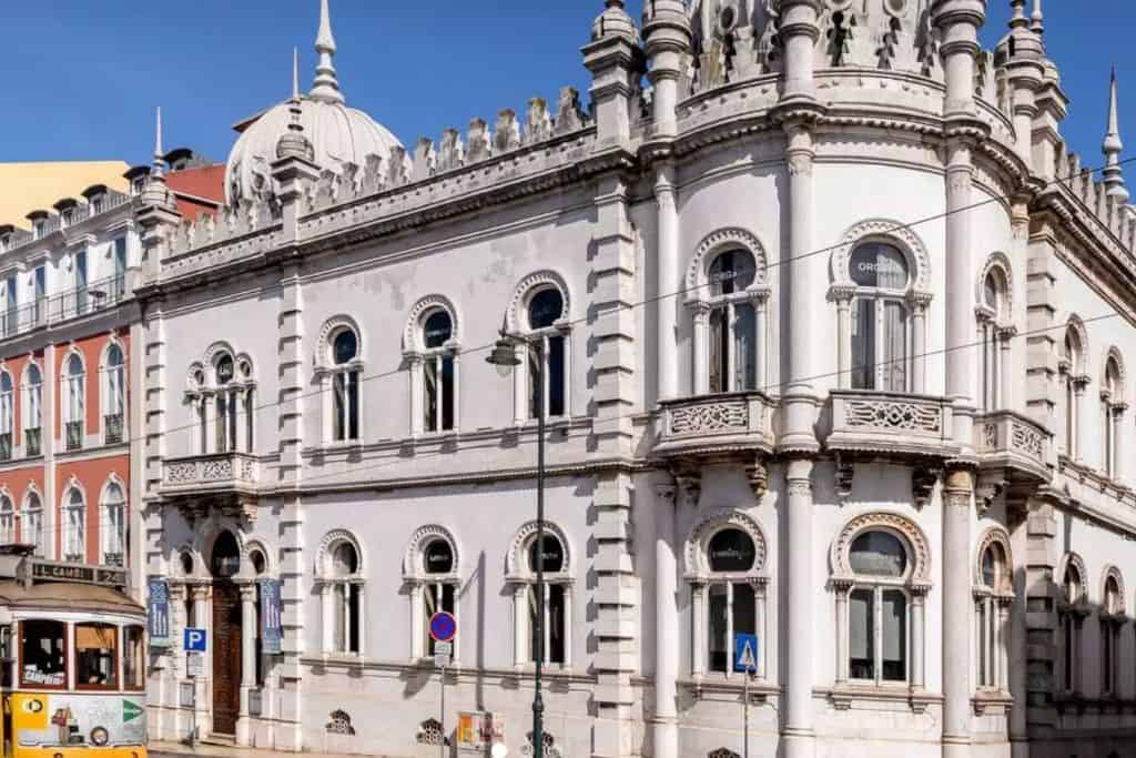 The white stone facade of Embaixada shopping mall in Lisbon.