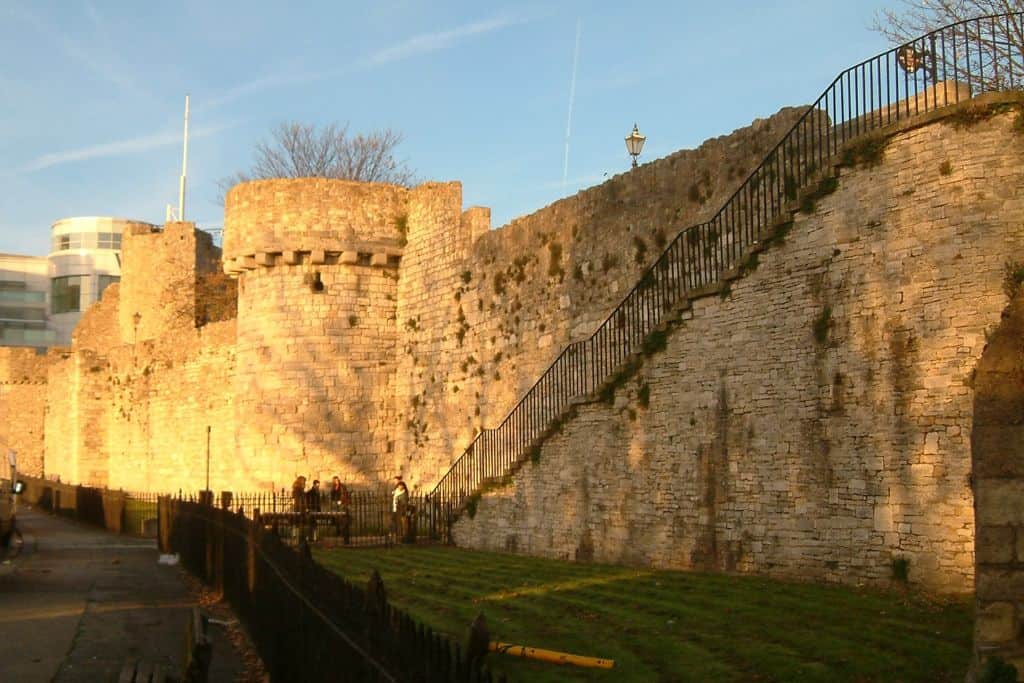 The sun is shining on the old protective walls of Southampton City centre