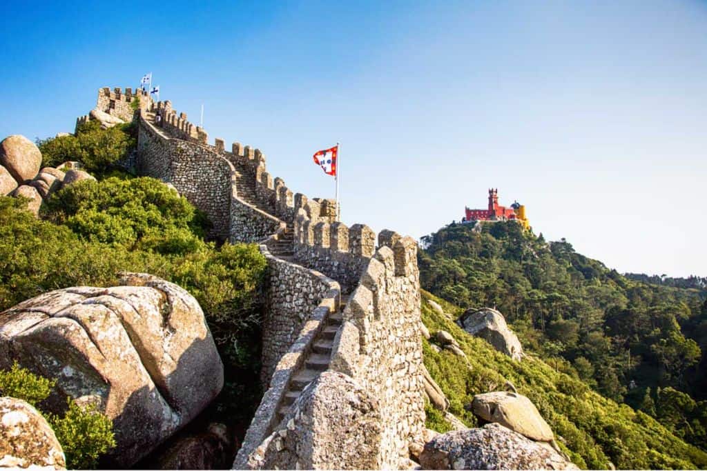 The Moorish Castle with it's wall going over the lush green hill.