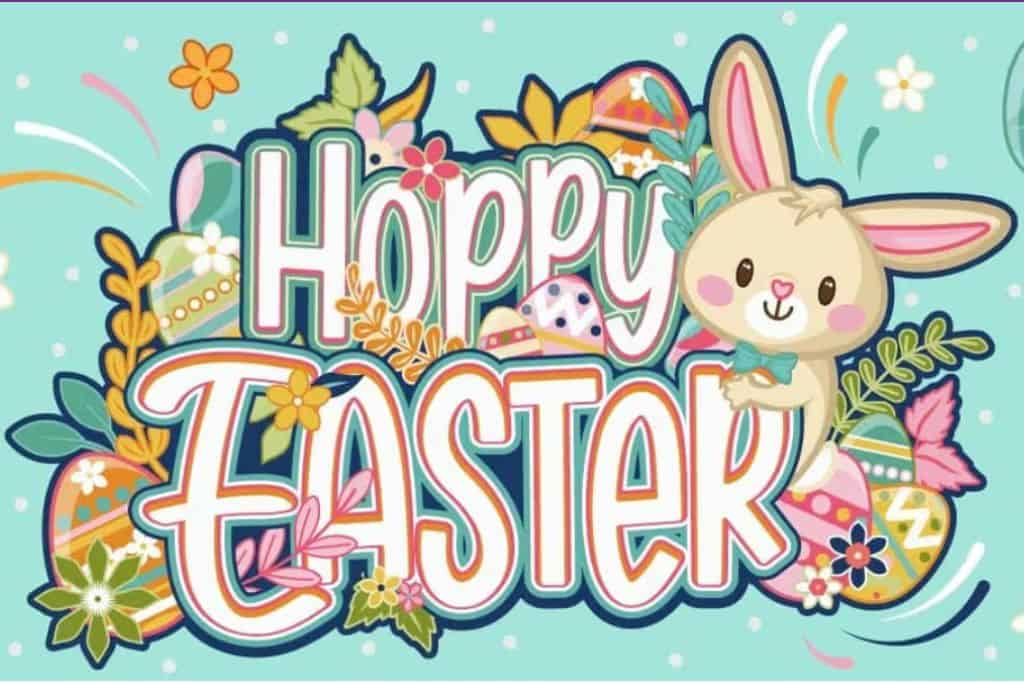 A poster with Hoppy Easter written in the middle of it in bubble writing.  On the right of the words is a cartoon rabbit.  Around the words are flowers, leaves and small Easter eggs.  This is aposter used to advertise the Easter activities avaialable at Paultons Park in Hampshire.
