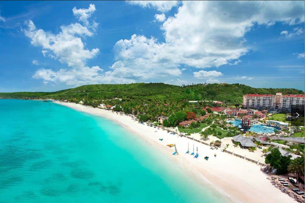 The view from the water of Sandals Resort which is the best Antigua all inclusive resorts for scuba diving.