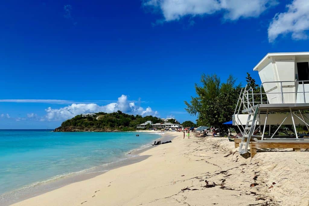 This is view along the golden sands of Ffryes Beach in Antigua with its lifeguard stations, it's one of the best and safest beaches on the island.