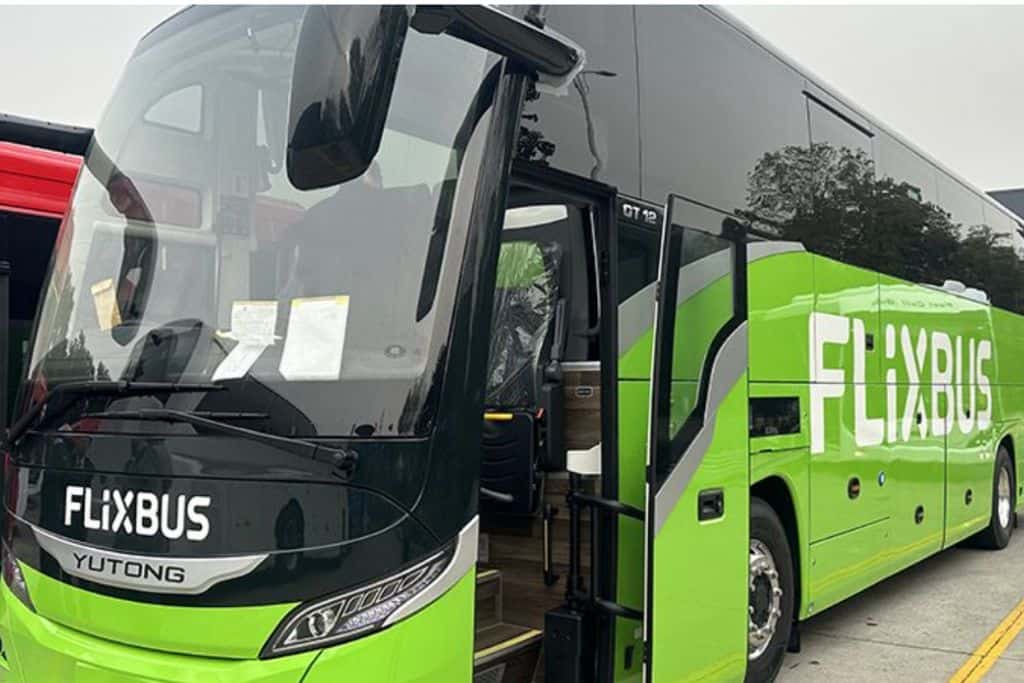 The lime green outside of the FlixBus which is one of the best ways to got from Lisbon to Nazare on a day trip.