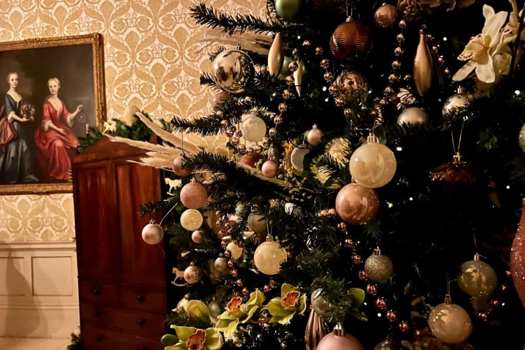 This is the inside of one of the rooms at Montisfont House near Romsey with a Christmas tree decorated in gold. 